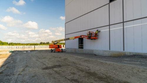 Working on side of Building